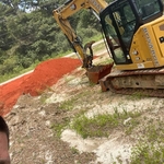 building up a dirt drive for customer