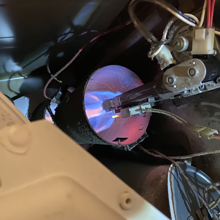 Gas dryer lighting properly