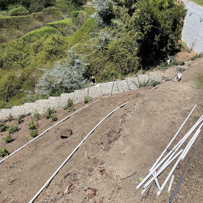 Hill side sprinkler system installation