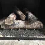 Resetting gas log set