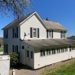White vinyl house wash