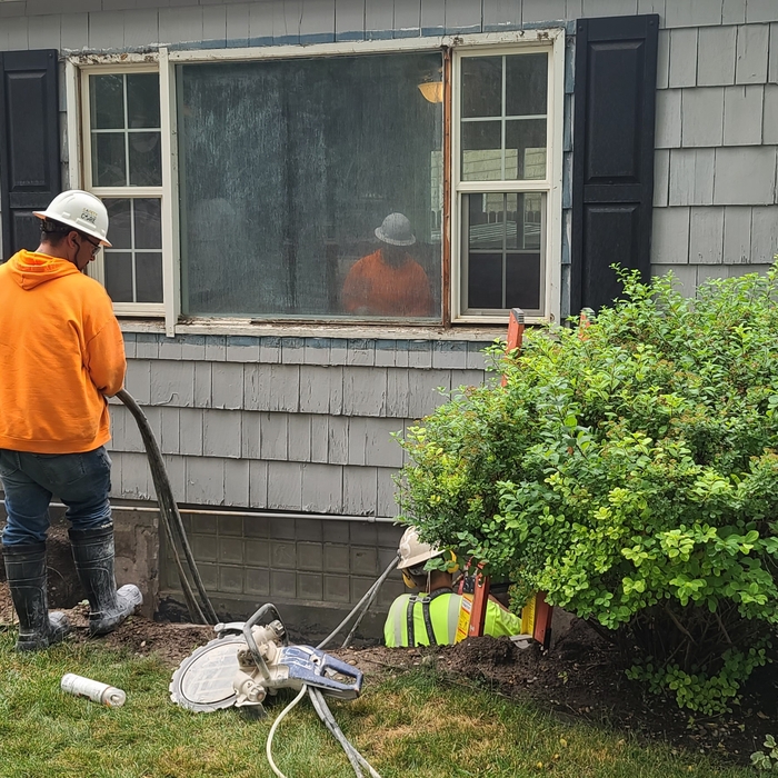 GETTING READY TO CUT CEMENT FOR THE EGRESS WINDOW