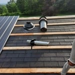 Metal over wood and shingles