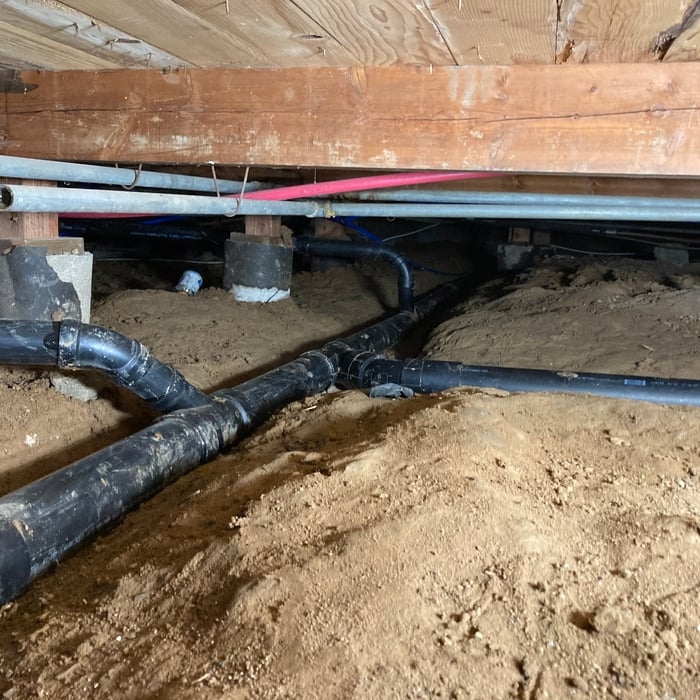 NEW DRAIN PIPES UNDER THE HOUSE