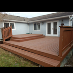 Replace existing deck with a new deck and patio