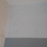 Damaged wall and ceiling corner