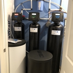 Multiple tanks to remove hardness and iron
