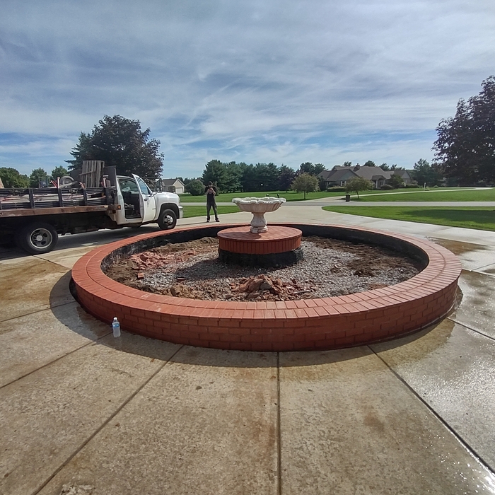 fountain and concrete drive