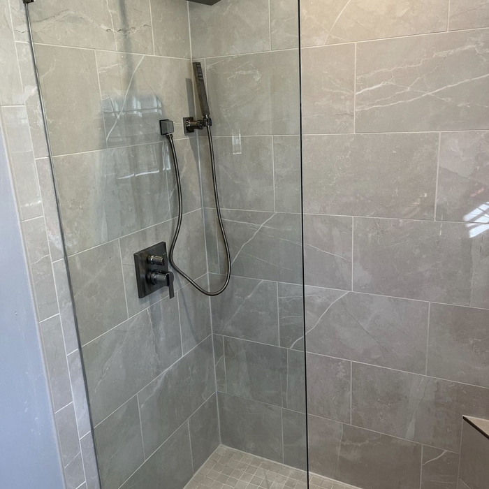 First after photo. 12x24 porcelain gloss tile.