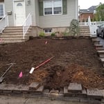 weeds and old lawn ripped out prepping sprinklers