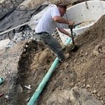 Connecting gutter downspouts to drainage system