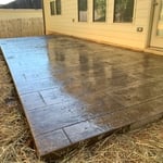 Wood plank stamped patio.