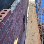 Brick front!