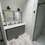 New vanity, mirror, lights, floor, shiplap