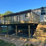 Wood deck with bar rail