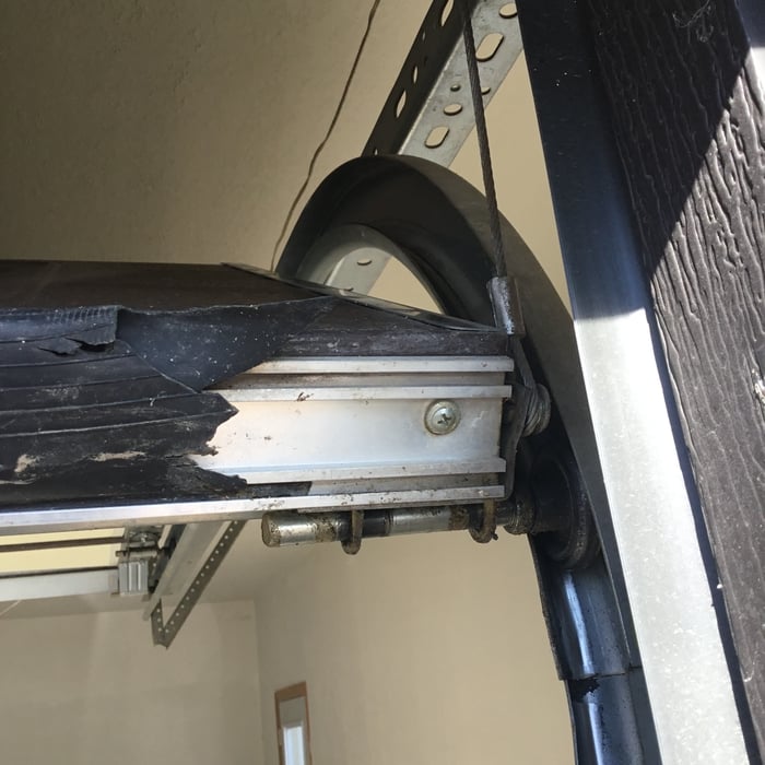 Worn weather strip on Garage Door