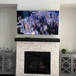 65" TV over fireplace