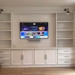 TV w/ white Sonos Beam