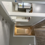 Install baseboard and casing moulding