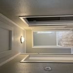 Install baseboard, casing molding, attic door.