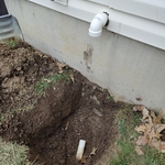 Replace sump pump drain l