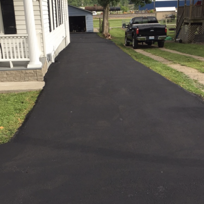 Asphalt sealcoating