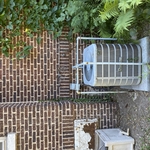 Clear Overgrowth Around AC Unit