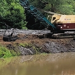 Dredging pond silt