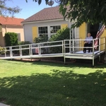 Man exiting home on ramp in Los Angeles, CA
