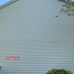 After photo of a softwash on a tall 2-story home