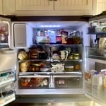 Cluttered fridge before