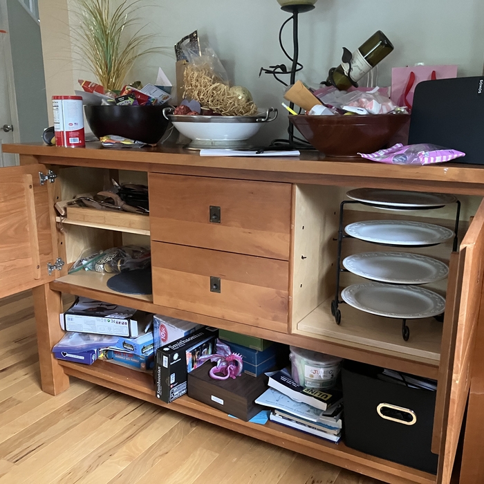 Before a cluttered serving table