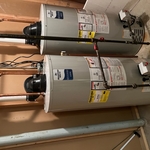 two 50 gallon power vent water heaters