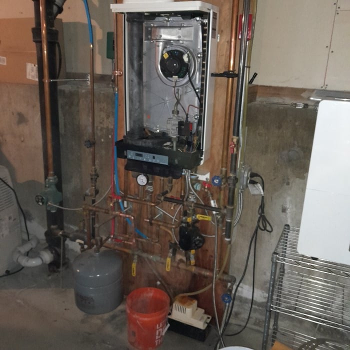 Combination central heat and hot water boiler