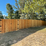Six foot privacy fence with gate.