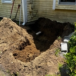 Trench up to the electrical meter.