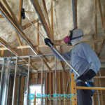 Wiping Mold off Truss after Treatment Applied.
