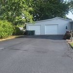 Asphalt sealcoating
