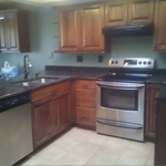 Custom Alder Cabinets W/ Desk @ Left Of Kitchen
