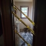 Caution tape bathroom