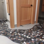 Resin floor going to shower pans