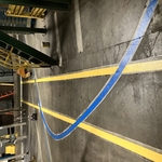 Floor striping with tugger line