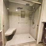 Walk-in shower with bench and tower fixture