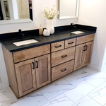 Primary bathroom cabinets and countertops