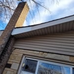 Repaired fascia board and installed metal