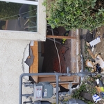 Car crash through stucco