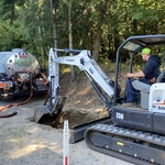 Billy on the excavator preparing for the new tank