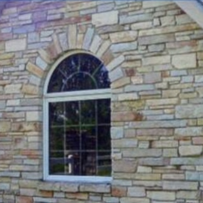 Stone gable Roman arch