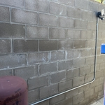 Inside of trash bin area conduit run.