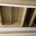 Custom built cabinet with ash shelves